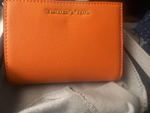 Charles keith orange pu logo - keith,