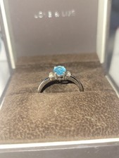 Ladies Ernest Jones Love and Life blue topaz ring size U, engagement/ promise