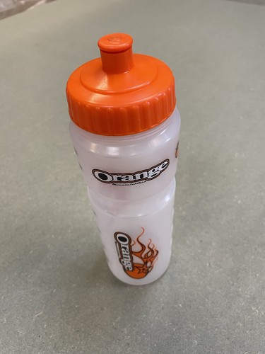 Orange mountain bikes water - bikes,