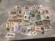 50 vintage cigarette cards.