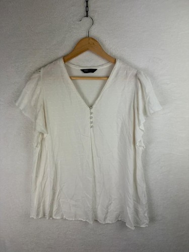 Ivory dobby flutter - m&s, sleeve