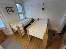 Feather And Black Cabin Bed