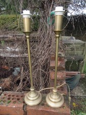 A Pair of Laura Ashley Home Gold Speckled  Tall Slim Candlestick Style Lamps