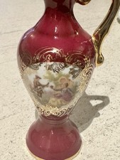 Red porcelain jug with gold