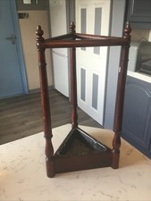 AN EDWARDIAN ANTIQUE MAHOGANY STICK STAND, OF SMALL PROPORTIONS.