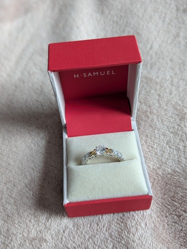 Silver trilogy ring included