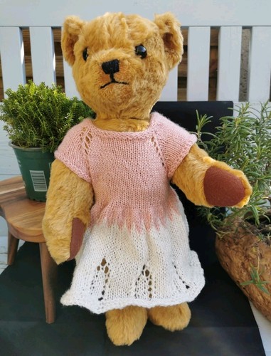 Hand knitted teddy bear