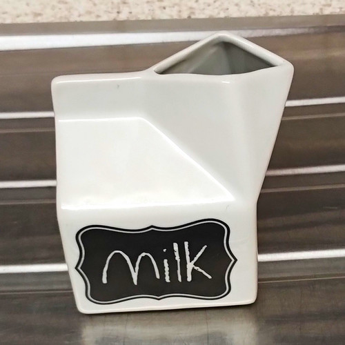 White ceramic milk - jug,, black