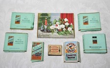 Vintage Collection of 7 Empty Cigarette Packets and 1 Vintage Match Box