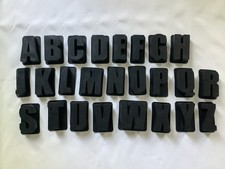  Large black silicone individual moulds, one set of  letters and one of numbers 