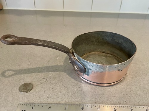 Antique copper saucepan