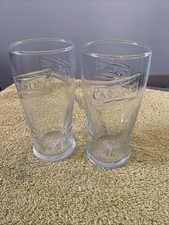 A Pair Of Carling Half Pint