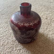 Bohemian cranberry glass decanter, likely from the 19th century