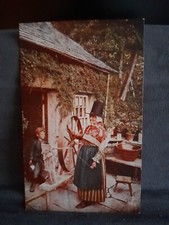 Old Welsh lady with spinning wheel old cottage 25192