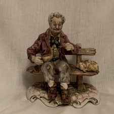 Capodimonte Tramp On Bench