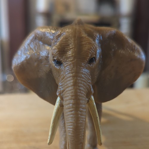 Brown plastic elephant - plastic,