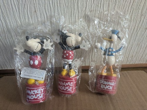 Disney wooden push puppet - wooden,