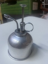 plant mister, sprayer or spritzer, used for watering delicate indoor plants