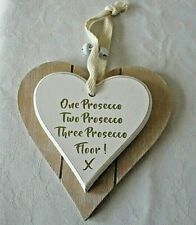 A Small Novelty Prosecco Wall Hanging 