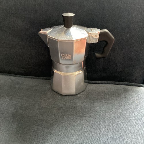 Stove top coffee maker - stove, cup