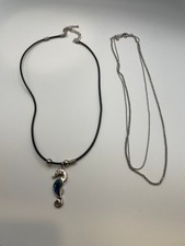 Silver tone seahorse pendant