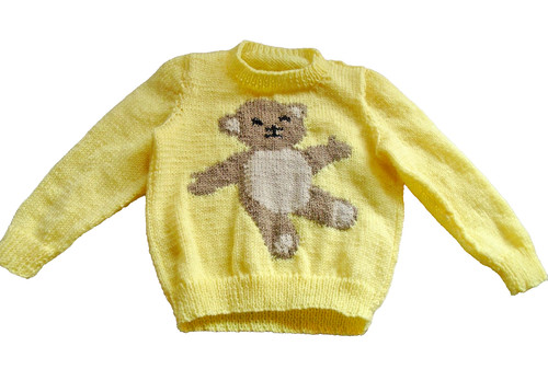 Hand knitted child - hand,