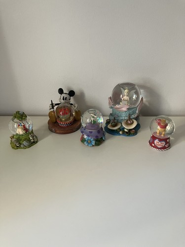 Disney store snow globe - store,