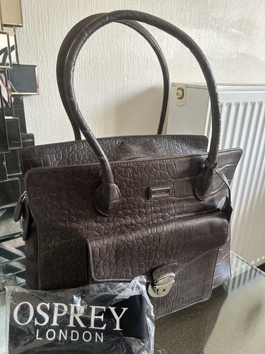Chocolate coloured leather - coloured,