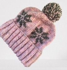 Cosy hand knitted adult bobble hat in wool mix aran tweed.