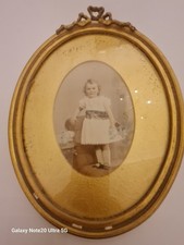 antique oval photograph framed