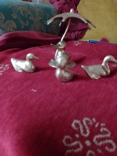 Four Brass Ducks