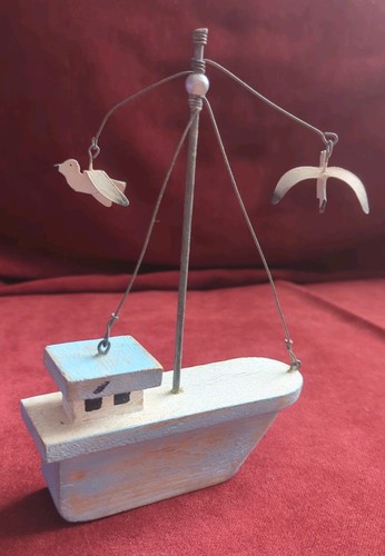 Wooden sailing boat flying - sailing,
