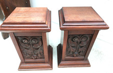 Pair of antique mahogany shop display stands, carved columns,  candle, statue