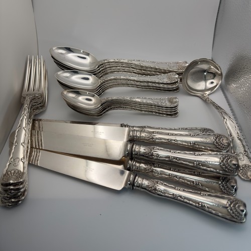 Tiffany cutlery set - &,