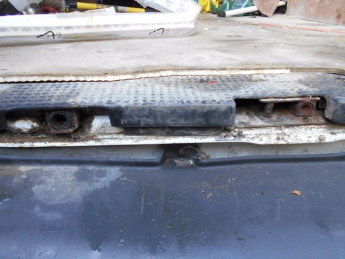 Rear door lower catches - rear,