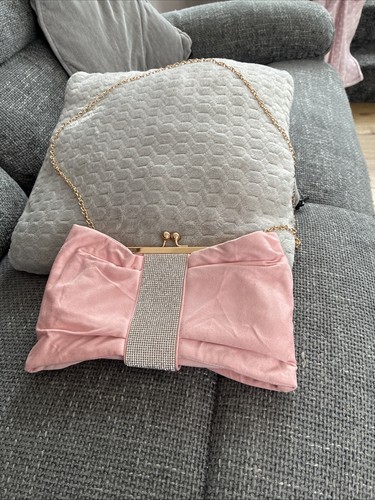 Pink clutch bag with - with, chain