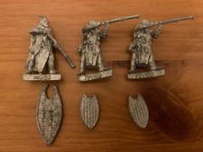 Mahud warriors with blow pipes