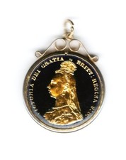 VICTORIA 1887 ENAMELLED SHILLING IN MOUNT