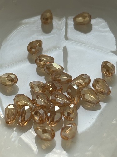 Faceted teardrop shaped beads - shaped,