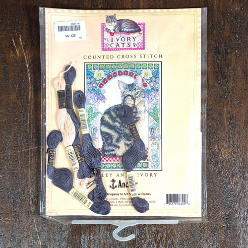 Anchor ivory cats counted - anchor,
