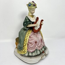 Melody in Motion Madame Lyre