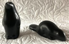 Two tactile Canadian carved