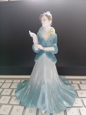 4 small figurines     coalport