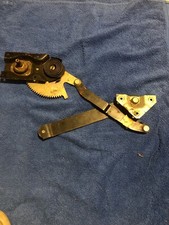 Ford Escort Mk3, Mk4 4 Door & Estate NOS Genuine Left Rear Window Regulator