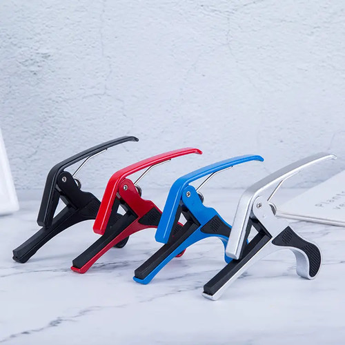 Quick change guitar capo - change,