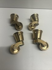Four Brass Cup Castors