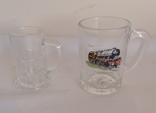Two miniature glass tankards - two,