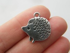 4 Hedgehog charms antique silver tone A657