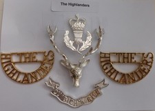 Cap Badge and Shoulder Titles