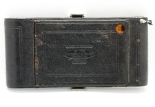 Rear door plate for folding